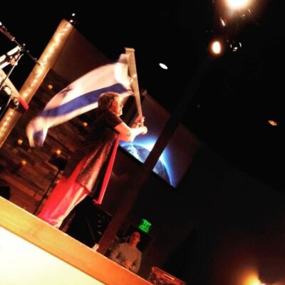 Lifting up the flag of Israel